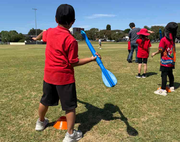 Boy about to throw foam javelin.