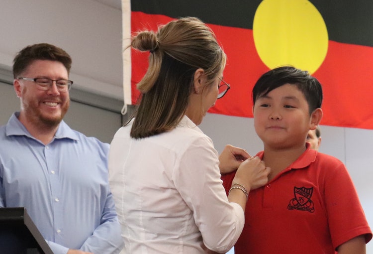 Student receiving award